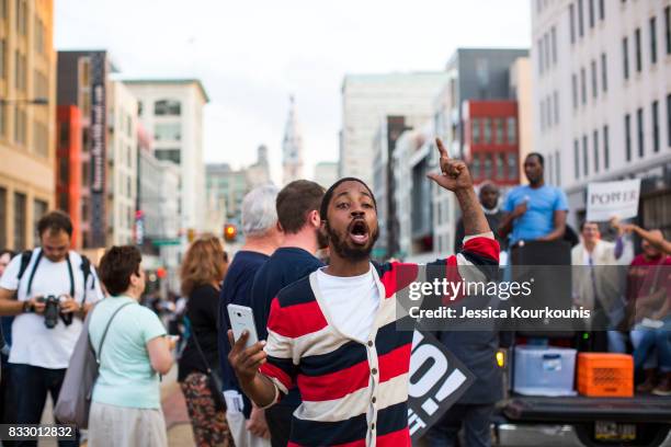 Demonstrators participate in a march and rally against white supremacy August 16, 2017 in downtown Philadelphia, Pennsylvania. Demonstrations are...