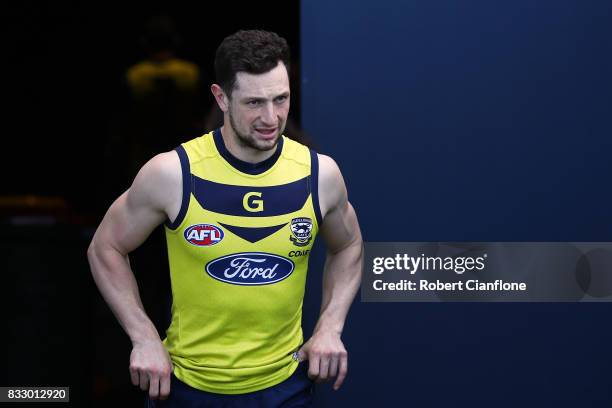 Darcy Lang of the Cats runs onto the field during a Geelong Cats AFL training session at Simonds Stadium on August 17, 2017 in Geelong, Australia.