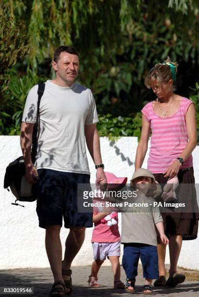 Gerry and Kate McCann take their children Amelie and Sean to the creche in Praia Da Luz, Portugal.