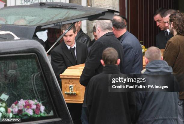The bodies of Caitriona and Caitlin Innes are carried out of the Church of the Immaculate Conception in Bundoran, Co Donegal, following their funeral...