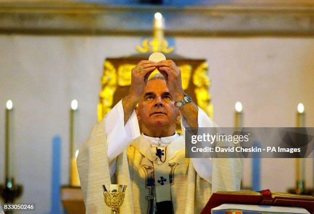 Cardinal Keith O'Brien takes the day's Catholic service at St Mary's Cathedral Edinburgh.