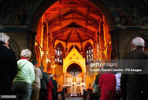 Cardinal Keith O'Brien takes the day's Catholic service at St Mary's Cathedral, Edinburgh.