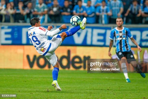 Luan of Gremio battles for the ball against Lucas Romero of Cruzeiro during the Gremio v Cruzeiro match, part of Copa do Brasil Semi-Finals 2017, at...