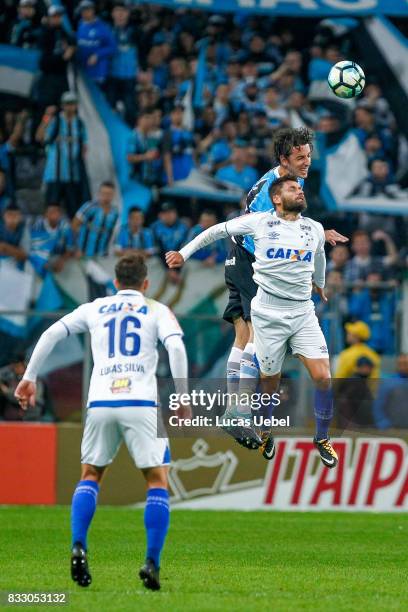 Pedro Geromel of Gremio battles for the ball against Rafael Sobis of Cruzeiro during the Gremio v Cruzeiro match, part of Copa do Brasil Semi-Finals...