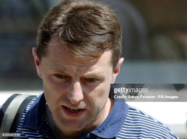 Gerry McCann leaves his apartment in Praia Da Luz, Portugal, as he travels to Germany and Holland as part of the campaign to find his daughter.