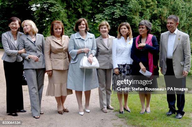 Partners of G8 leaders Alie Abe, Laureen Harper, Ludmila Putina, Cherie Blair, Laura Bush, Margarida Uva, Flavia Prodi and Joachim Sauer, visit...