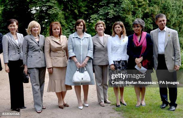 Partners of G8 leaders Alie Abe, Laureen Harper, Ludmila Putina, Cherie Blair, Laura Bush, Margarida Uva, Flavia Prodi and Joachim Sauer, visit...