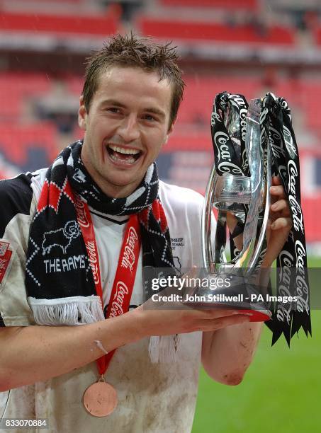 Derby County's Matt Oakley celebrates winning promotion.