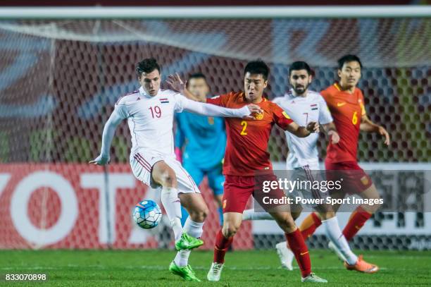 Mohamad Muhtadi of Syria fights for the ball with Ren Hang of China PR during their 2018 FIFA World Cup Russia Final Qualification Round Group A...