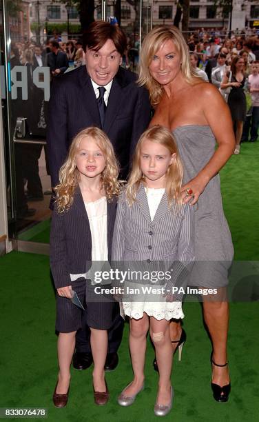 Mike Myers poses with Meg Mathews, her daughter and friend at the UK Premiere of Shrek The Third at the Odeon Cinema in Leicester Square, central...