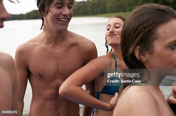 group of friends at lake - emotion meer stockfoto's en -beelden