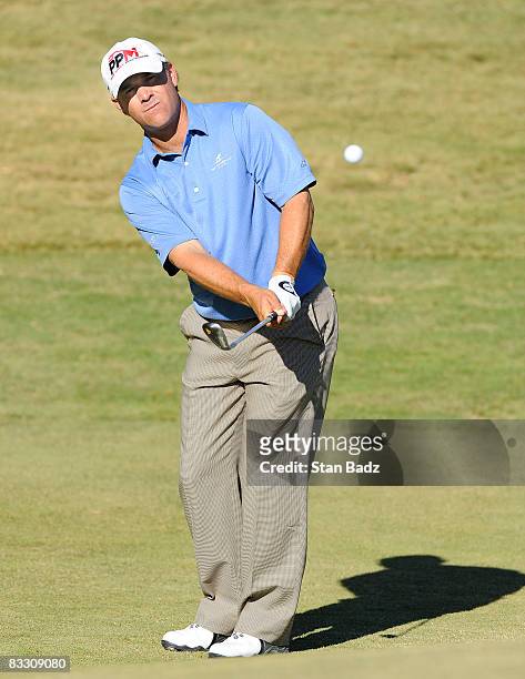 Scott McCarron chips onto the ninth green during the first round of the Justin Timberlake Shriners Hospitals for Children Open held at TPC Summerlin...