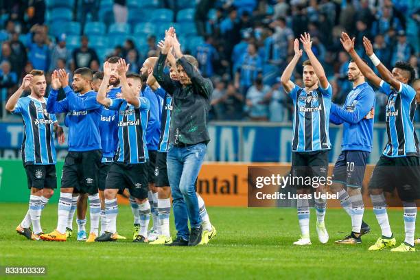 PLayers of Gremio celebrate after winning the Gremio v Cruzeiro match, part of Copa do Brasil Semi-Finals 2017, at Arena do Gremio on August 16, 2017...