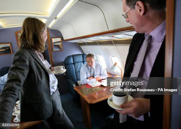 Previously unreleased photo of Prime Minister Tony Blair on route to Berlin to meet German Chancellor Angela Merkel aboard the Royal Flight with...