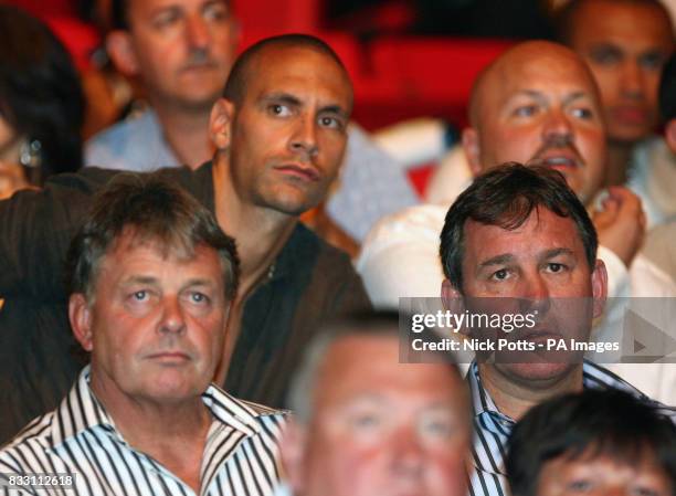 Manchester United's Rio Ferdinand and Sheffield United manager Bryan Robson watch England's Ricky Hatton defeat Mexico's Jose Luis Castillo after a...