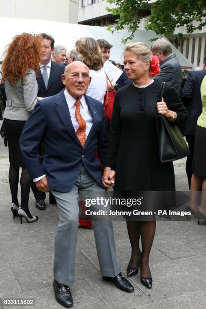 Sir Stirling Moss and his wife Susie attend a service of thanksgiving for the life of Ian Wooldridge, the former Daily Mail sports journalist at...