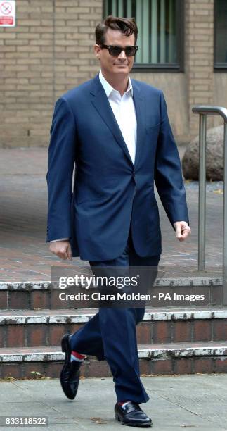 American oil and banking heir Matthew Mellon leaves Southwark Crown Court in London after being cleared today of teaming up with a crooked private...