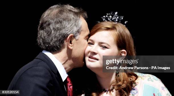 Prime Minister Tony Blair kisses daughter Kathryn as he prepares to leave 10 Downing Street for the final time.