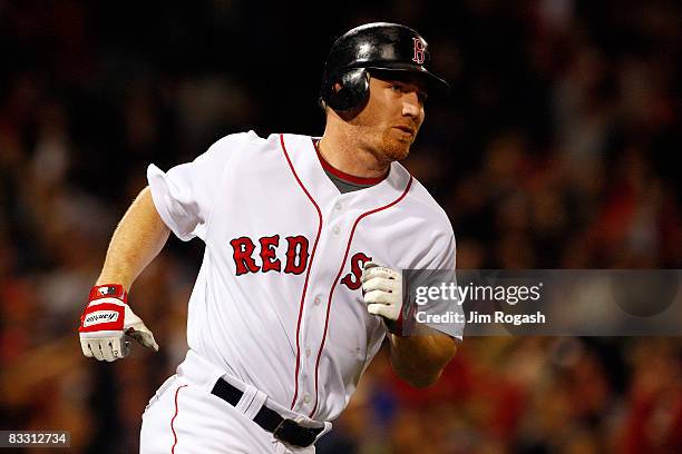 Drew of the Boston Red Sox rounds the bases after hitting a two-run home run against the Tampa Bay Rays in the eighth inning of game five of the...