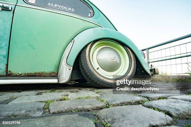 part of a rusted vw käfer (beetle) oldtimer parked during the event with magnus walker on the fish market hamburg - be basic hub stock pictures, royalty-free photos & images