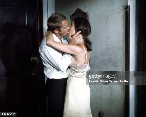 American actor Steve McQueen as Doc McCoy and American actress Ali MacGraw as Carol McCoy on the set of The Getaway, directed by Sam Peckinpah, 1972.