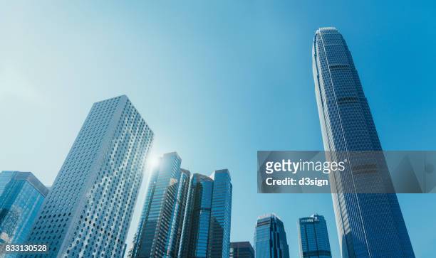 modern financial skyscrapers in central business district, hong kong - building hong kong stock pictures, royalty-free photos & images