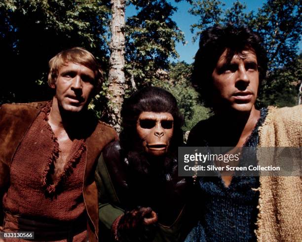 Ron Harper, Roddy McDowall and James Naughton on the set of the US television series, 'Planet of the Apes', USA, circa 1974. The science fiction...