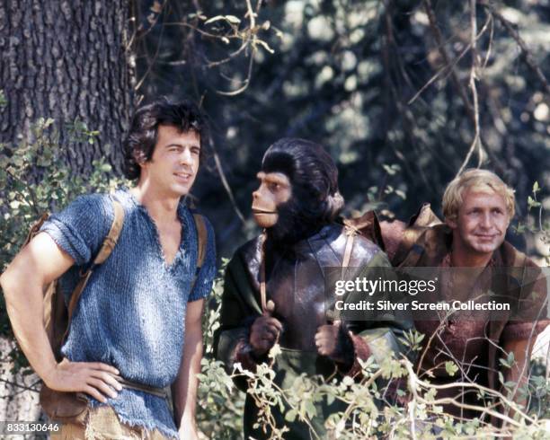 Ron Harper, Roddy McDowall and James Naughton on the set of the US television series, 'Planet of the Apes', USA, circa 1974. The science fiction...