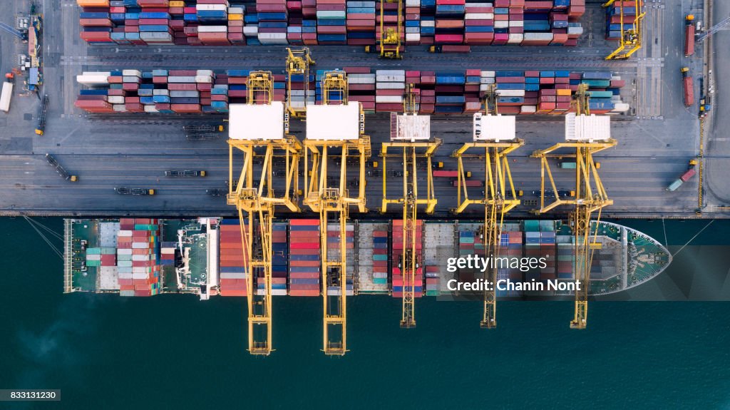 Aerial view container harbor with crane, top view