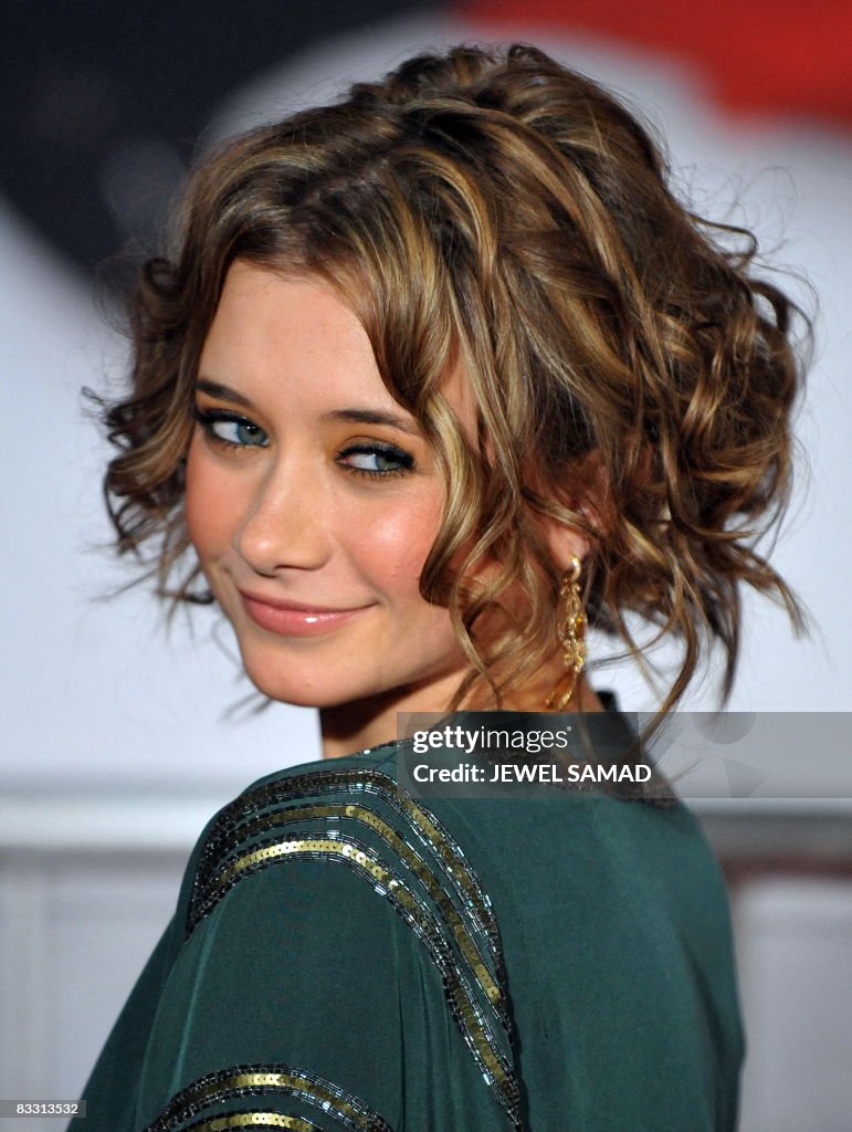 Cast member Olesya Rulin arrives for the premiere of the "High School