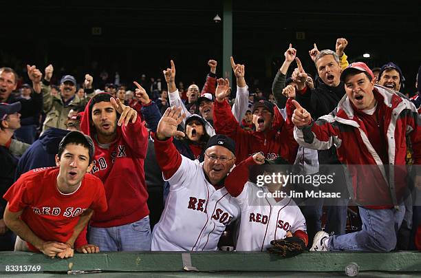 Fans of the Boston Red Sox celebrate after defeating the Tampa Bay Rays in game five of the American League Championship Series during the 2008 MLB...