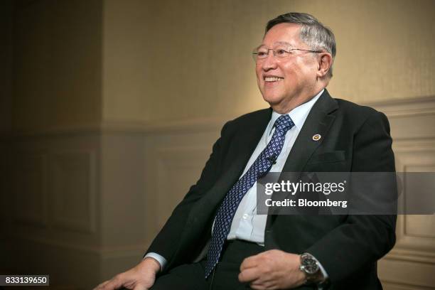 Carlos Dominguez, the Philippines' secretary of finance, listens during a Bloomberg Television interview in Singapore, on Tuesday, Aug. 15, 2017....