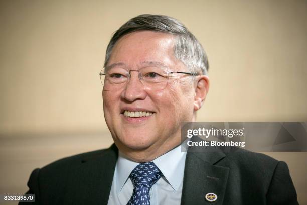 Carlos Dominguez, the Philippines' secretary of finance, listens during a Bloomberg Television interview in Singapore, on Tuesday, Aug. 15, 2017....