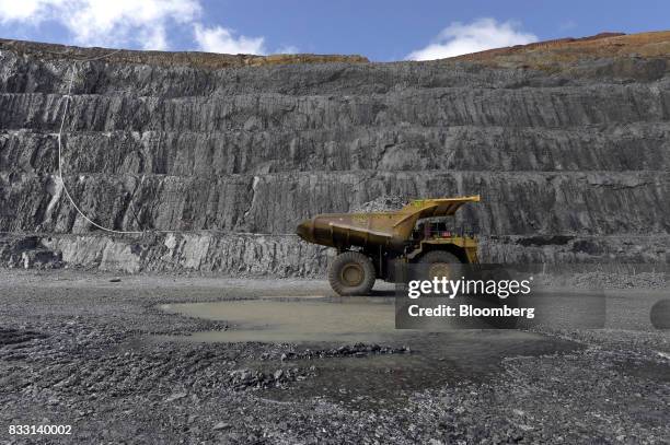 Dump truck sits in the Invincible open pit mine at the St Ives Gold Mine operated by Gold Fields Ltd. In Kambalda, Australia, on Wednesday, Aug. 9,...