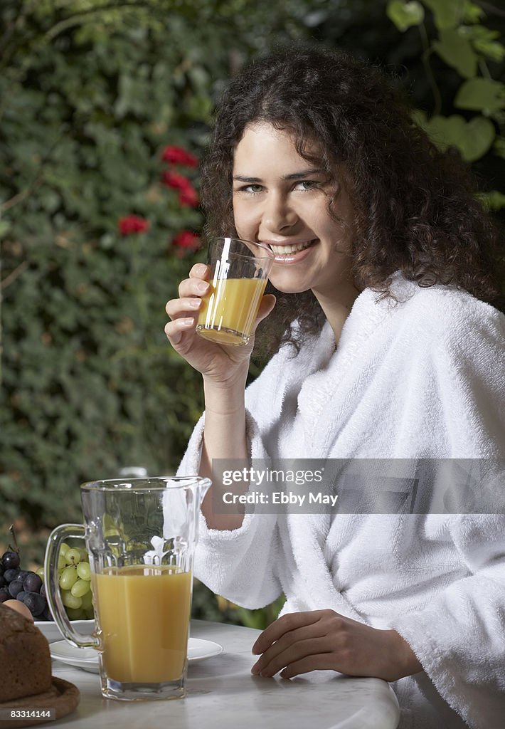 Young woman with orange juice