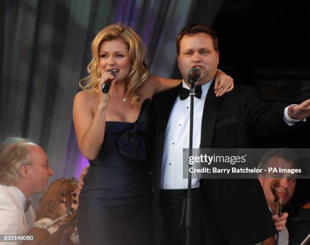 Welsh mezzo-soprano Katherine Jenkins sings with Paul Potts at the Katherine in the Park event in the grounds of Margam Park in South Wales.