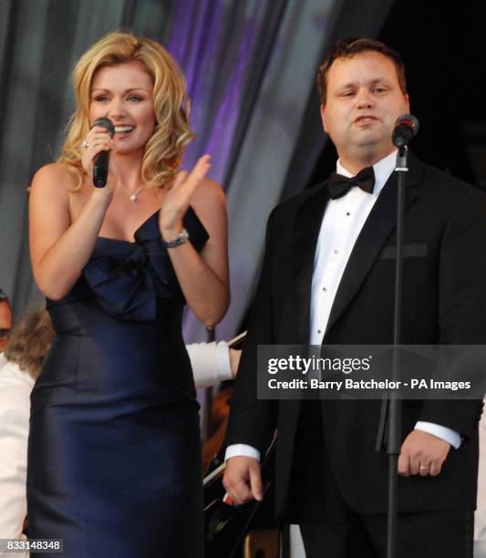 Welsh mezzo-soprano Katherine Jenkins sings with Paul Potts at the Katherine in the Park event in the grounds of Margam Park in South Wales.