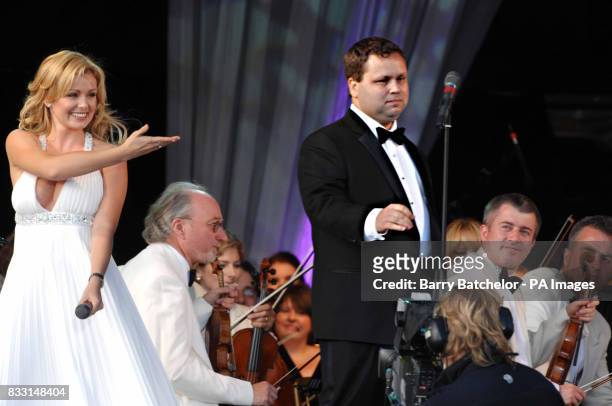 Welsh mezzo-soprano Katherine Jenkins sings with Paul Potts at the Katherine in the Park event in the grounds of Margam Park in South Wales.