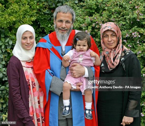 Yusuf Islam, formerly known as Cat Stevens , holds his grand daughter with his wife Fauzia Islam and daughter Asmaa Islam, as he receives an honorary...