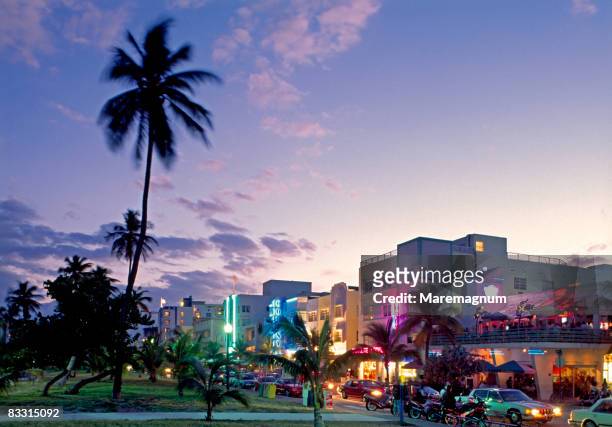 miami, miami beach, ocean drive at twilight - ocean drive stock pictures, royalty-free photos & images