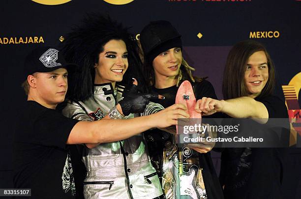 Musical group Tokio Hotel pose with award in the press room during the 7th Annual "Los Premios MTV Latin America 2008" Awards held at the Auditorio...