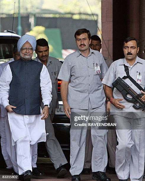 Indian Prime Minister Manmohan Singh arrives at Parliament house in New Delhi on October 17, 2008 to attend the opening of the second leg of the...