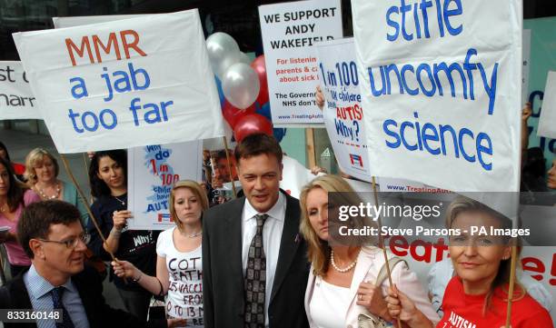 Dr Andrew Wakefield and his wife Carmel stand as they arrive at a General Medical Council hearing in central London where Dr Wakefield will hear...