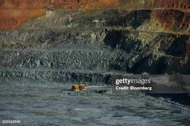 Equipment operates in the Neptune open pit mine at the St Ives Gold Mine operated by Gold Fields Ltd. In Kambalda, Australia, on Wednesday, Aug. 9,...