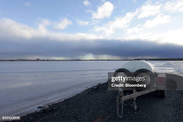 Water tank sits on the edge of a salt lake near the St Ives Gold Mine operated by Gold Fields Ltd. In Kambalda, Australia, on Wednesday, Aug. 9,...