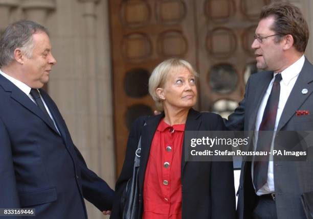 Victoria Otley, her partner Bob Preston and and Ian Beaumont of 'Bowel Cancer UK' outside the High Court in London.