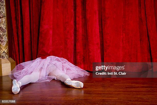 ballerina stuck under stage curtain - woman stuck floor stock pictures, royalty-free photos & images
