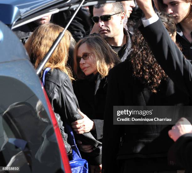 Elisabeth Depardieu holds her daughter Julie Depardieu after Guillaume Depardieu's funeral service at Notre-Damme Church on October 17, 2008 in...