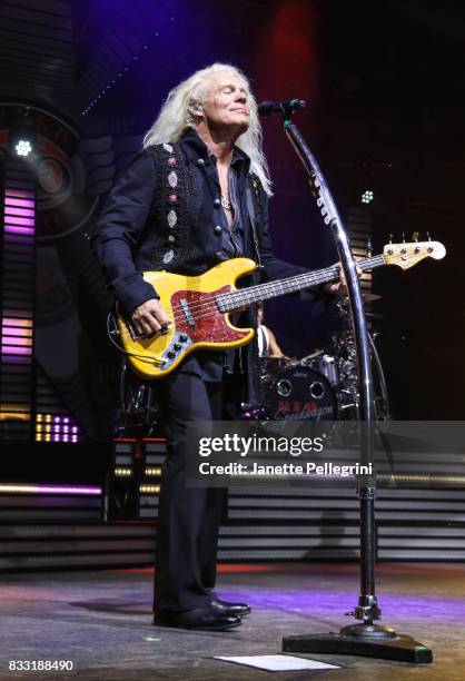Bruce Hall from REO Speedwagon performs in concert at Northwell Health at Jones Beach Theater on August 16, 2017 in Wantagh, New York.