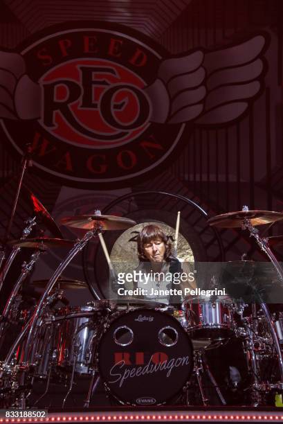 Bryan Hitt from REO Speedwagon performs in concert at Northwell Health at Jones Beach Theater on August 16, 2017 in Wantagh, New York.